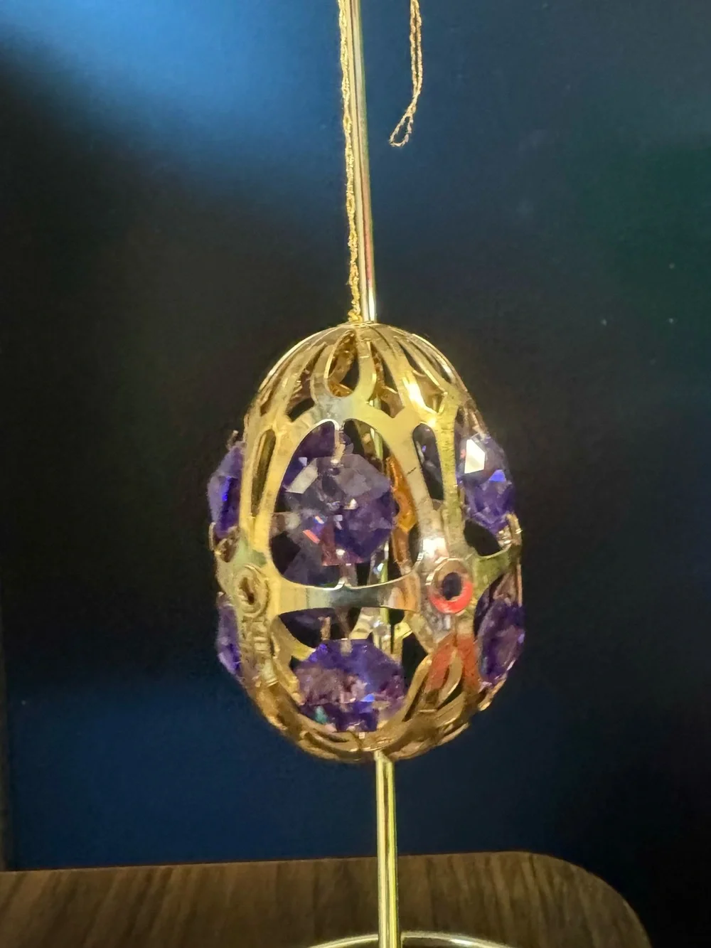 Gold-Tone Filigree Egg Ornament with Purple Gem Accents